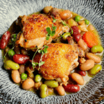 Crispy Chicken Thighs Over Vinegar Beans