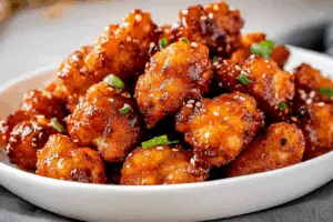 Sweet and Spicy Baked Popcorn Chicken