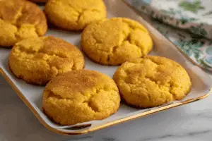 Honey butter cornbread cookies on wooden tray