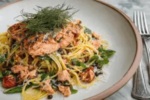 Salmon Linguine With Chilli Oil served hot with parmesan