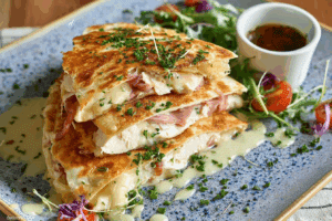 Chicken Cordon Bleu Quesadillas served hot with creamy Parmesan Dijon