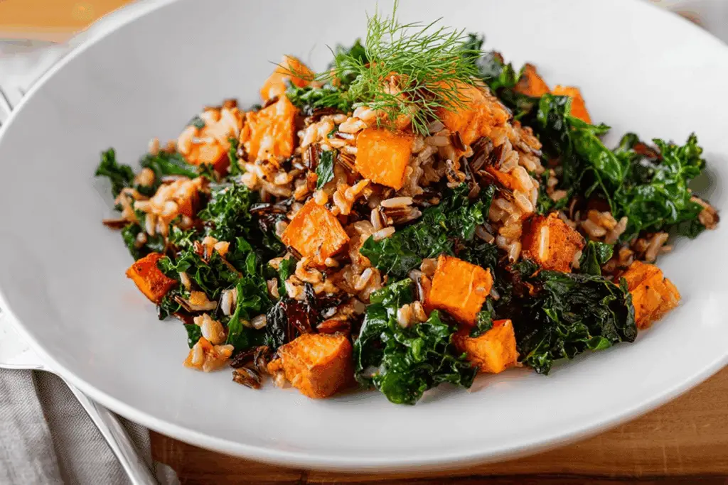 Caramelized Sweet Potato and Kale Fried Wild Rice served with vinaigrette
