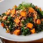 Caramelized Sweet Potato and Kale Fried Wild Rice served with vinaigrette