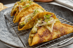 Potato Tacos with Green Chilies served fresh with toppings