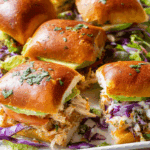 Shredded rotisserie chicken sliders fresh from oven