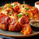 Pull Apart Pizza Monkey Bread close-up with melted cheese