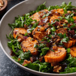A vibrant Chipotle Lime Sweet Potato Salad in a ceramic bowl