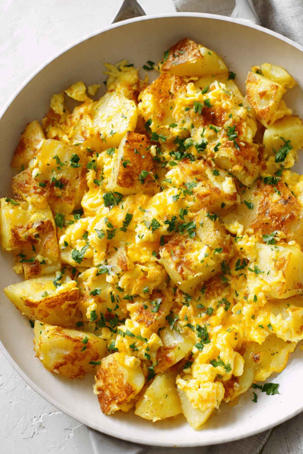 Cheesy Potato Egg Scramble