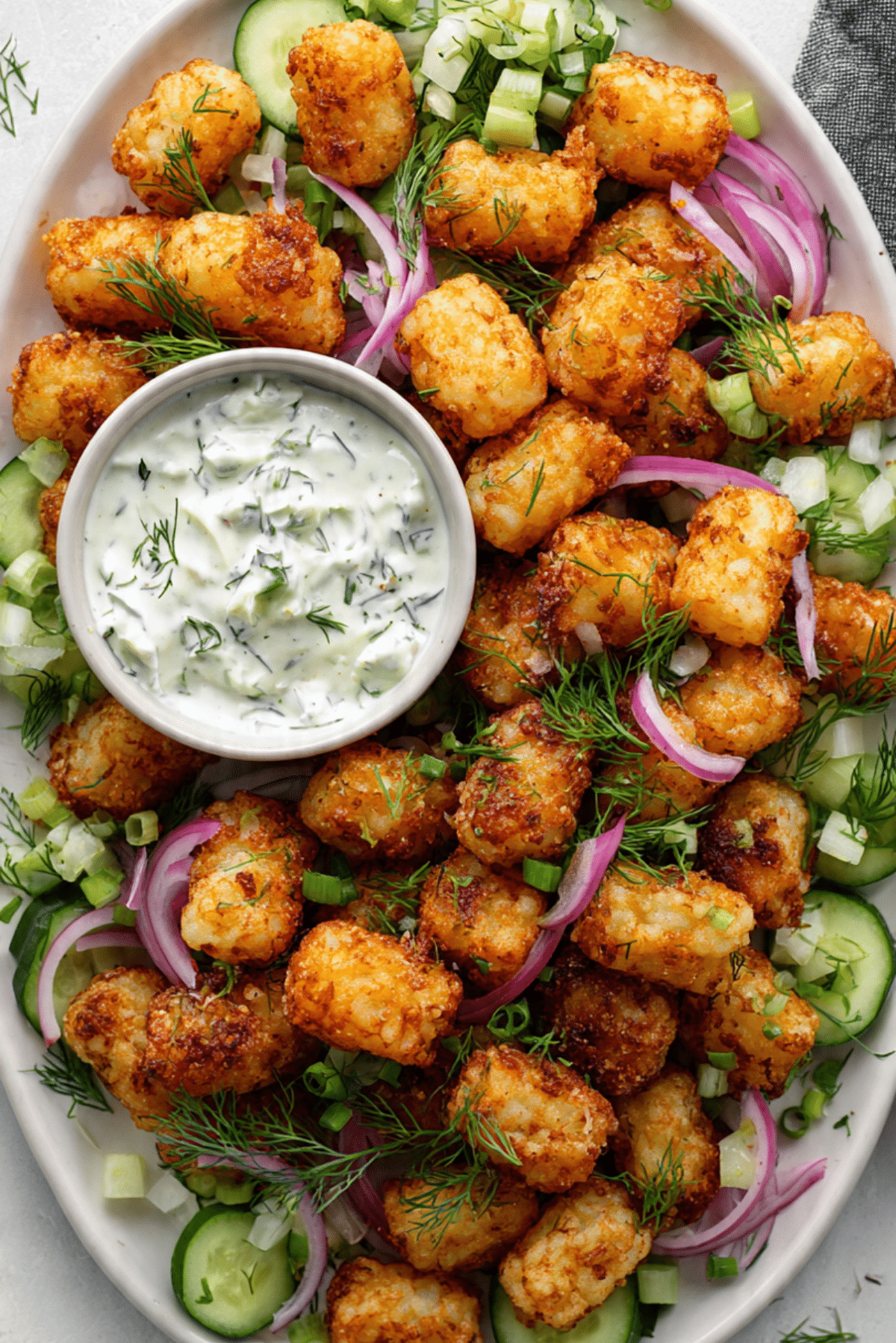 Smashed Tater Tot Salad With Dill Pickle Yogurt Dressing