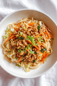 SAUCY CHICKEN & VEGGIE EGG ROLL NOODLE BOWLS