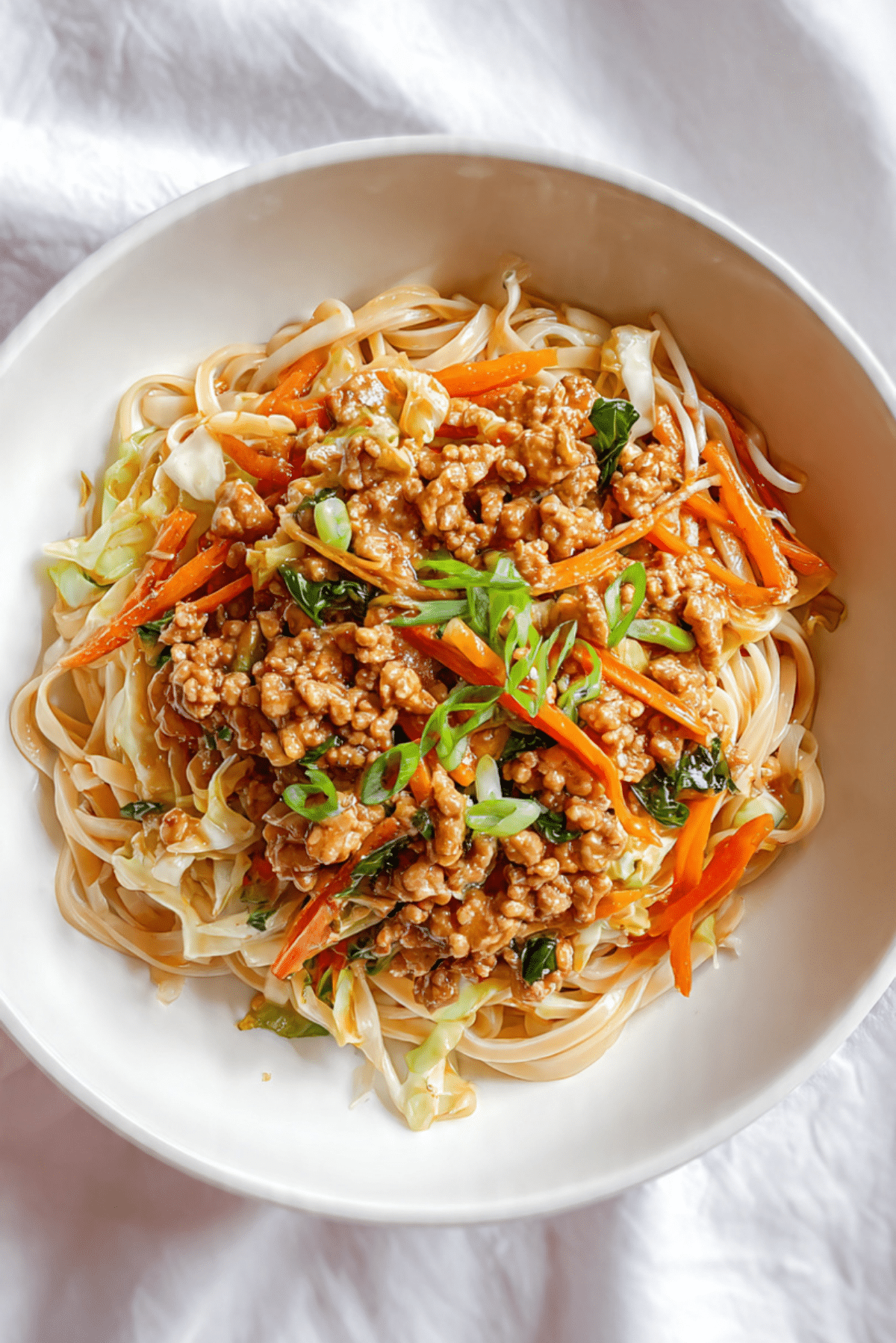 SAUCY CHICKEN & VEGGIE EGG ROLL NOODLE BOWLS